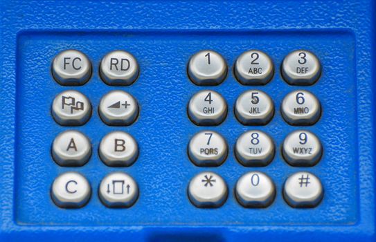Closeup Public Phone button