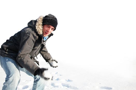 Young man out on a bright winter day