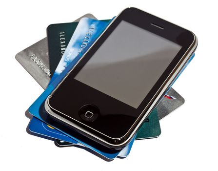 mobile phone with credit cards, isolated, white background
