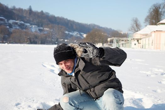 Young man out on a bright winter day