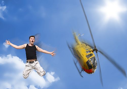 A boy jumps without a parachute from a helicopter