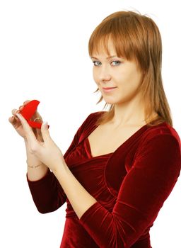 young girl with a box for rings on a wite background