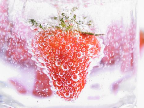 Fresh Strawberry in Mineral water with boobles