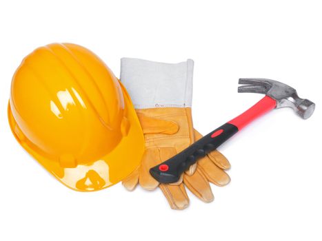 Orange HardHat Hammer And Leather Gloves on white