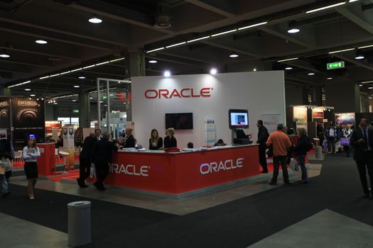 People visit Oracle technologies stand during SMAU, international fair of business intelligence and information technology in Milan, Italy.