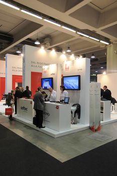 People visit Olivetti technologies stand during SMAU, international fair of business intelligence and information technology in Milan, Italy.