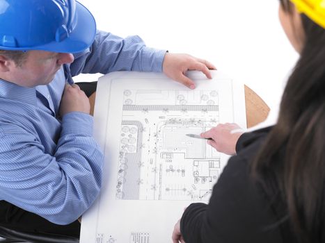 Two architects with helmet on meeting