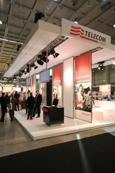 People visit Telecom technologies stand during SMAU, international fair of business intelligence and information technology in Milan, Italy.