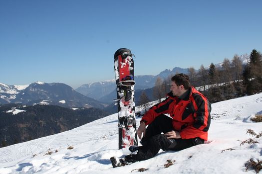 Young man in ski holiday in the Alps