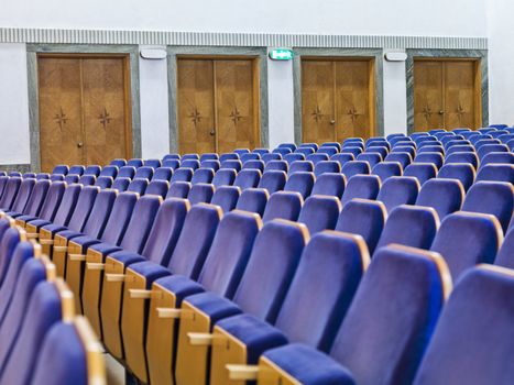 Blue Spectators seats in an old teather building