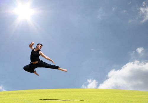 A boy jumping with excitement in the air