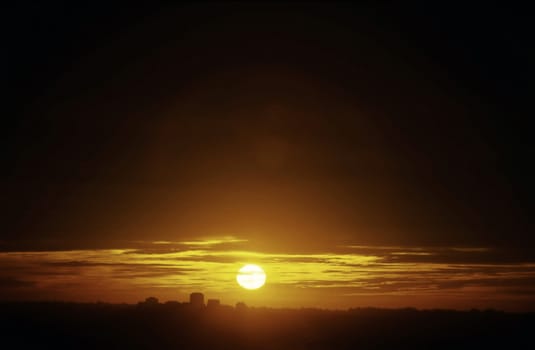 Sun setting over California Town