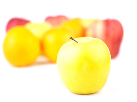 Group of Fruit Blured and Yellow Apple in Focus