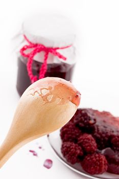 Wooden spoon with blackberry jam