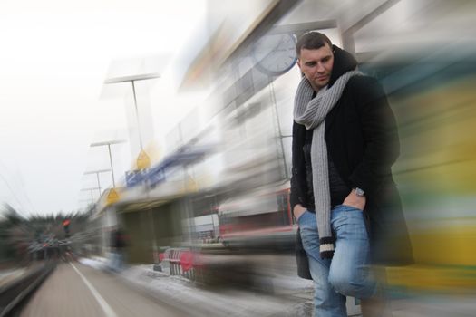 Young man traveling by train through Germany