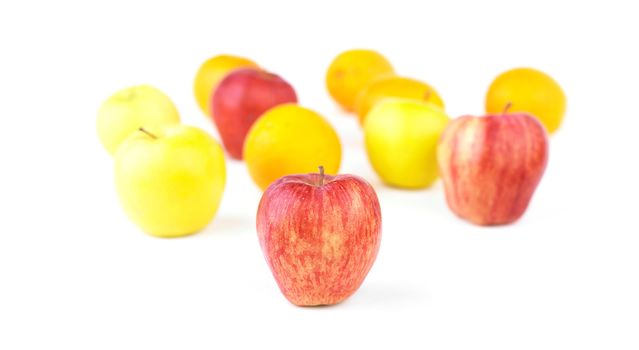 Group of Fruit Blured and Red Apple in Focus
