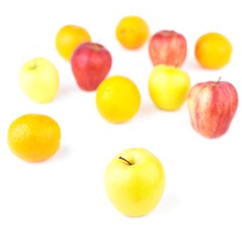 One Yellow Apple Inf Focus and Fruit mix blurred