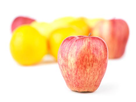 Group of Fruit Blured and Red Apple in Focus