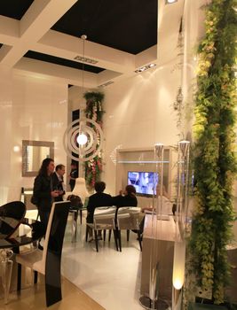 Looking at interiors design stands and home architecture solutions visiting 2011 Salone del Mobile, international furnishing accessories exhibition in Milan, Italy.