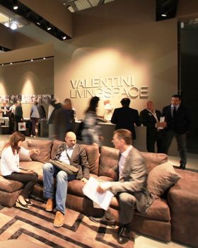 People visit interiors design stands and home architecture solutions at 2011 Salone del Mobile, international furnishing accessories exhibition in Milan, Italy.