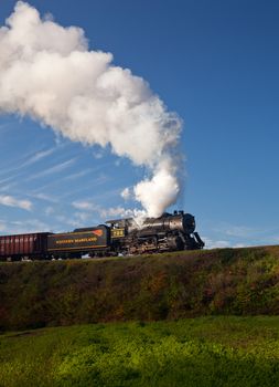 CUMBERLAND, MD - OCTOBER 17: Western Maryland Railroad steam train on October 17, 2011. This scenic railroad offers excursions pulled by a 1916 Baldwin locomotive