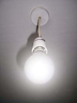 Hanging light-bulb, photo and illustration mix