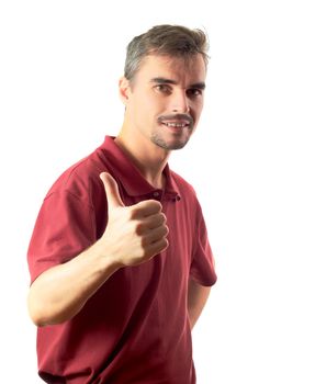 Happy casual young man showing thumb up and smiling isolated on white background