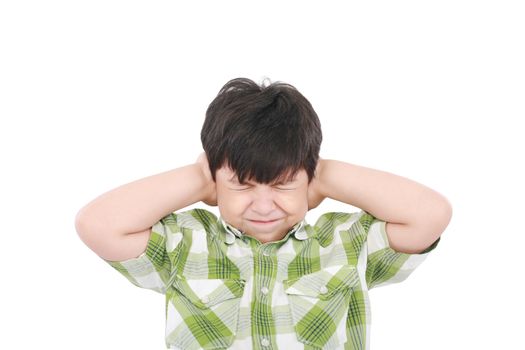 Little boy closing his eyes and ears with his hands, isolated on white