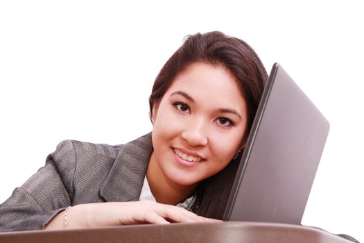 Young business woman on a laptop - isolated on white