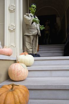 Halloween Decoration and Pumpkins in Front of House from the Street