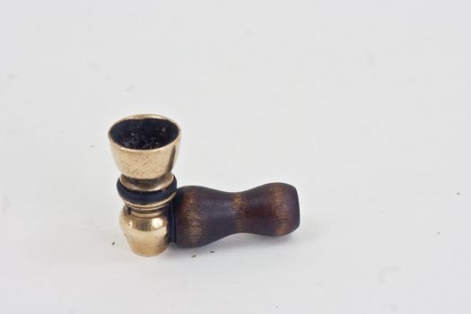 Marijuana pipe on a white background