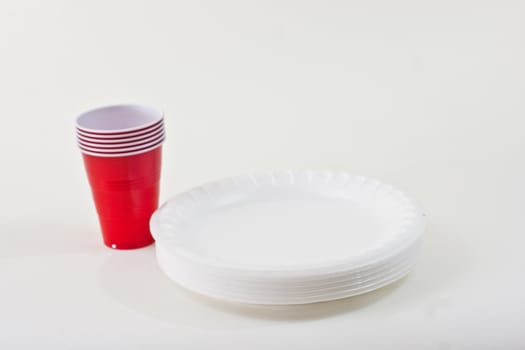 Styrofoam Plates and Cups on a white background.