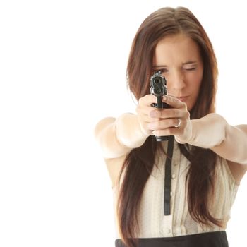 Young woman with hand gun isolated
