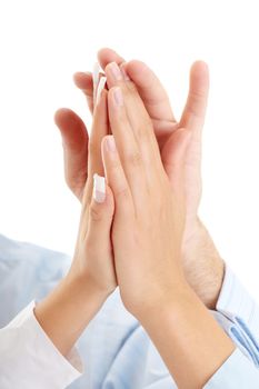 Success, partnership and teamwork concept. Hands of a successful business team on a white background