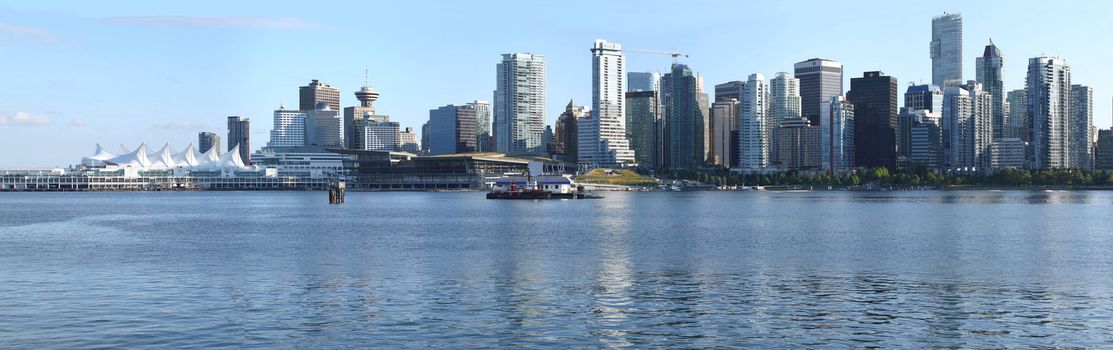 A panorama of the Vancouver BC skyline & Canada Place waterfront.