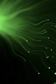 Abstract style close up capturing the ends of green fibre optic light strands against dark background.