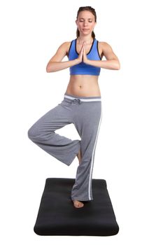 Isolated young yoga fitness woman