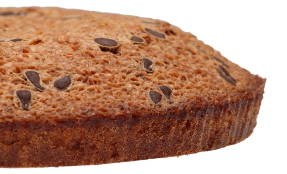 Close-up image of a half of a round cake with chocolate against a white background.