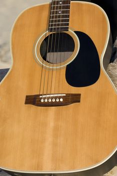 Close up of a six string guitar