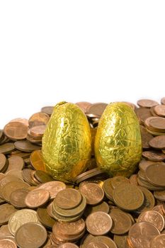 Golden eggs on coinage. Success in business