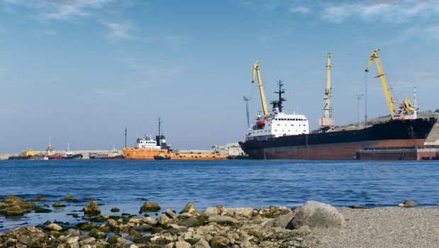 Seaport. The moored vessels in picturesque Atlantic to port