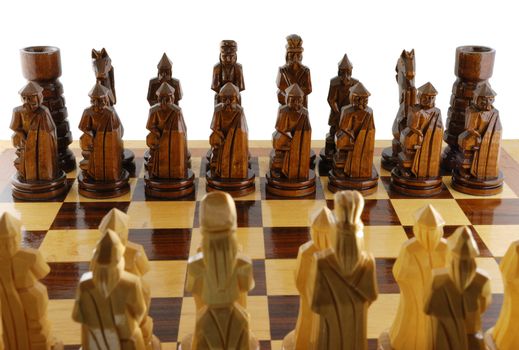 party chess. The placed party from chessmen. Figures - from a tree, manual work