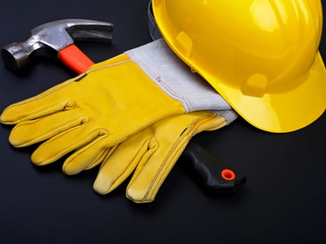 HardHat Hammer And Gloves on black