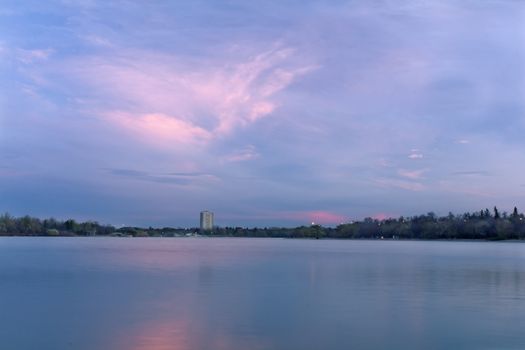 Beautiful clouds over Wascana lake right after sunset