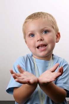 Beuatiful Blond toddler with big blue eyes