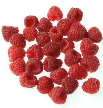 Upper view of raspberries against a white background.