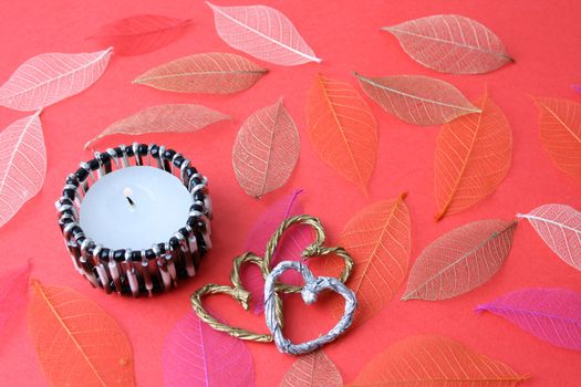Ethnic Candle holder with autumn leaves and hearts