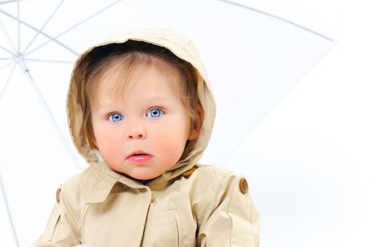 Very Cute Image of a Young baby Girl In hood in the studio
