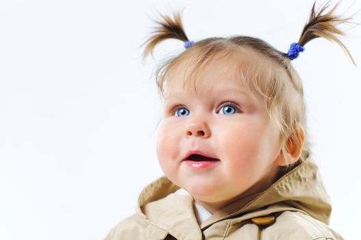 Portrait Very Cute baby Girl clouseup in studio