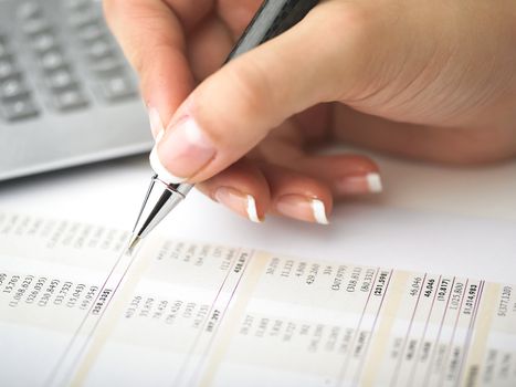 Market Analyze - pen and calculator on papers
